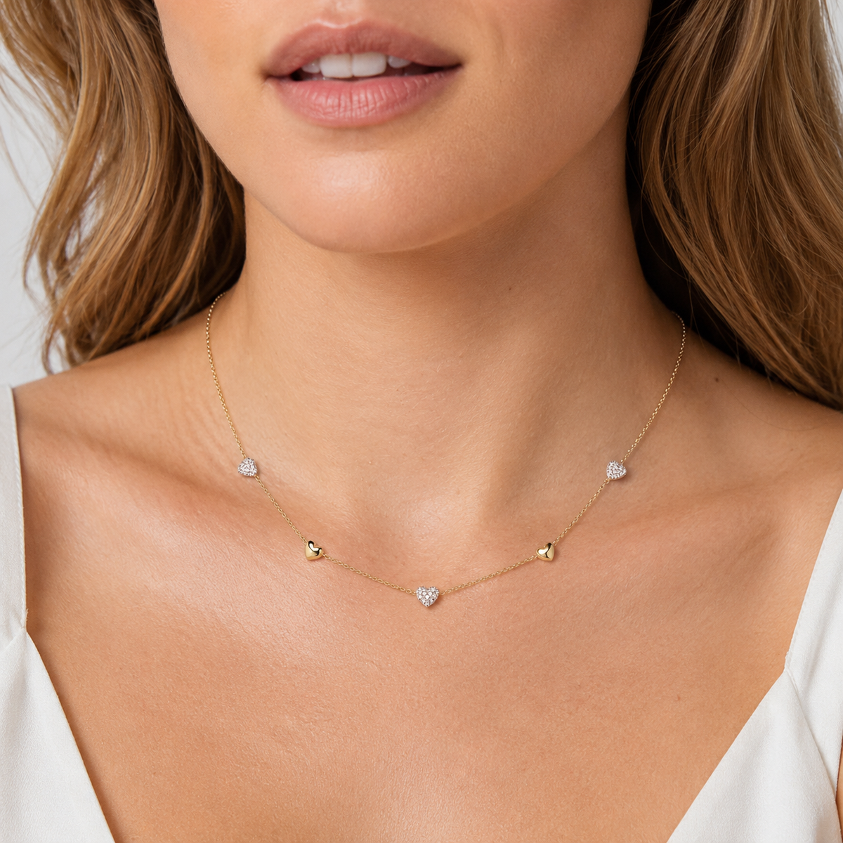 Gold-Plated Crystal Heart Station Necklace with Mixed Heart Charms