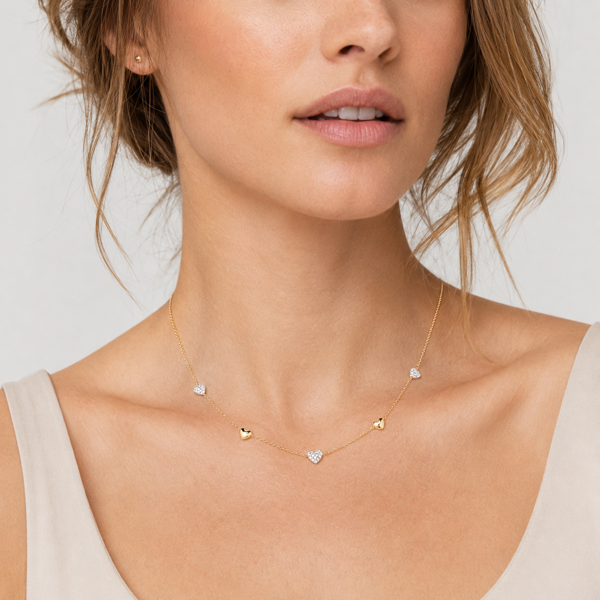 Gold-Plated Crystal Heart Station Necklace with Mixed Heart Charms