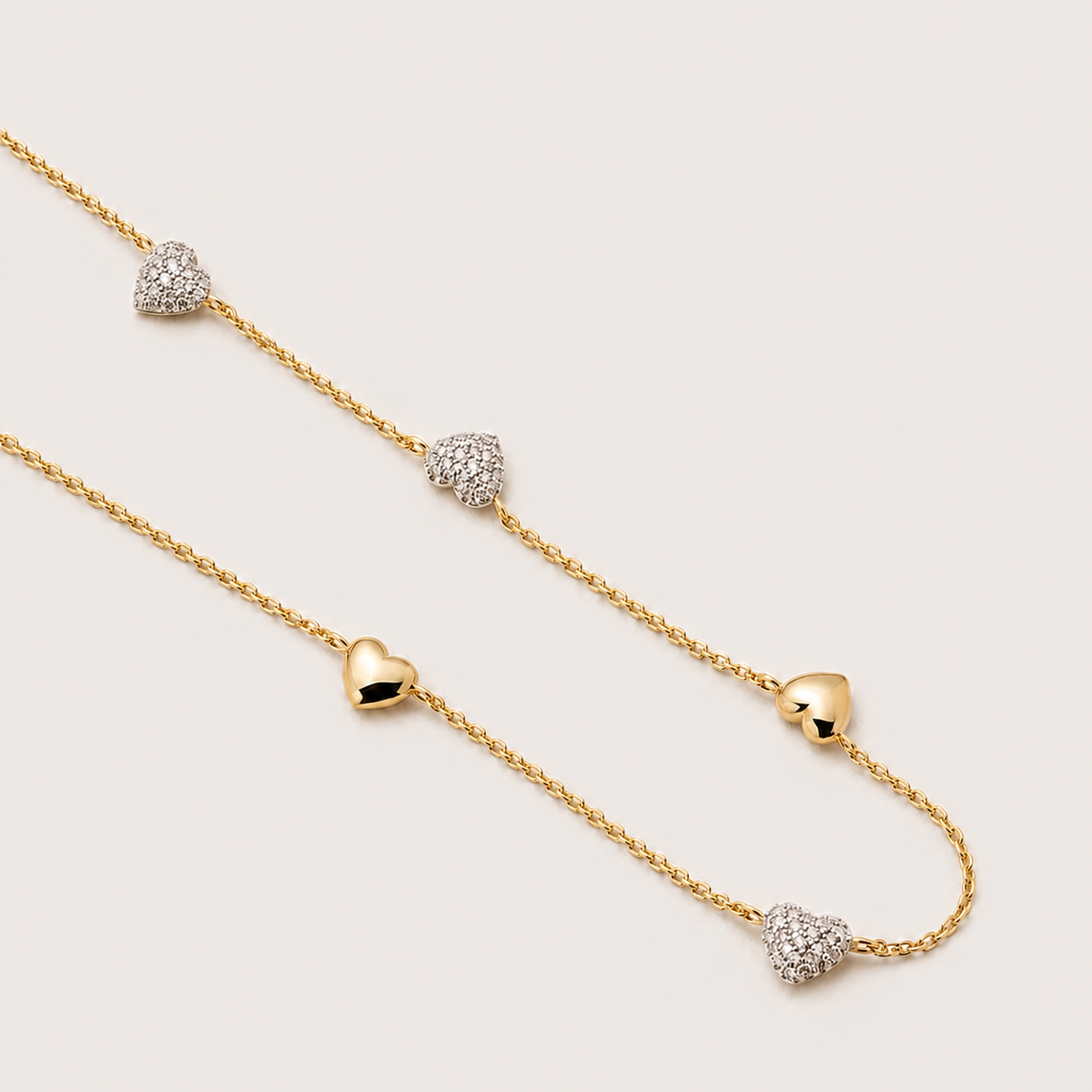 Gold-Plated Crystal Heart Station Necklace with Mixed Heart Charms