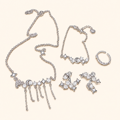 Women’s Celestial Cubic Zirconia Necklace, Earrings, Bracelet & Ring Set with Star and Tassel Details