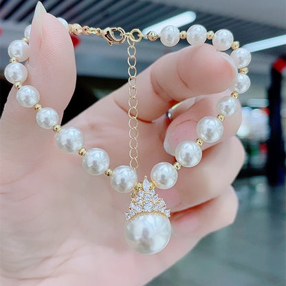 Women’s Elegant Pearl Beaded Bracelet with Crystal Crown Charm Detail