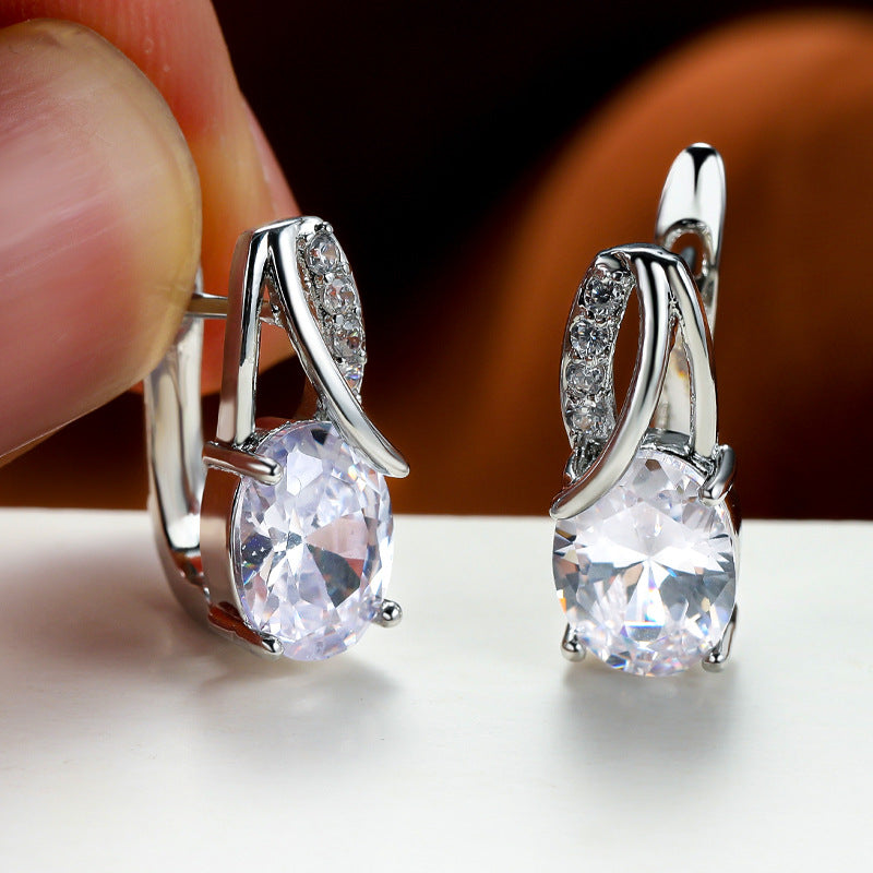 Women’s Multicolor Oval-Cut Cubic Zirconia Drop Earrings with Pavé Twist Detail – Gold & Silver Tone