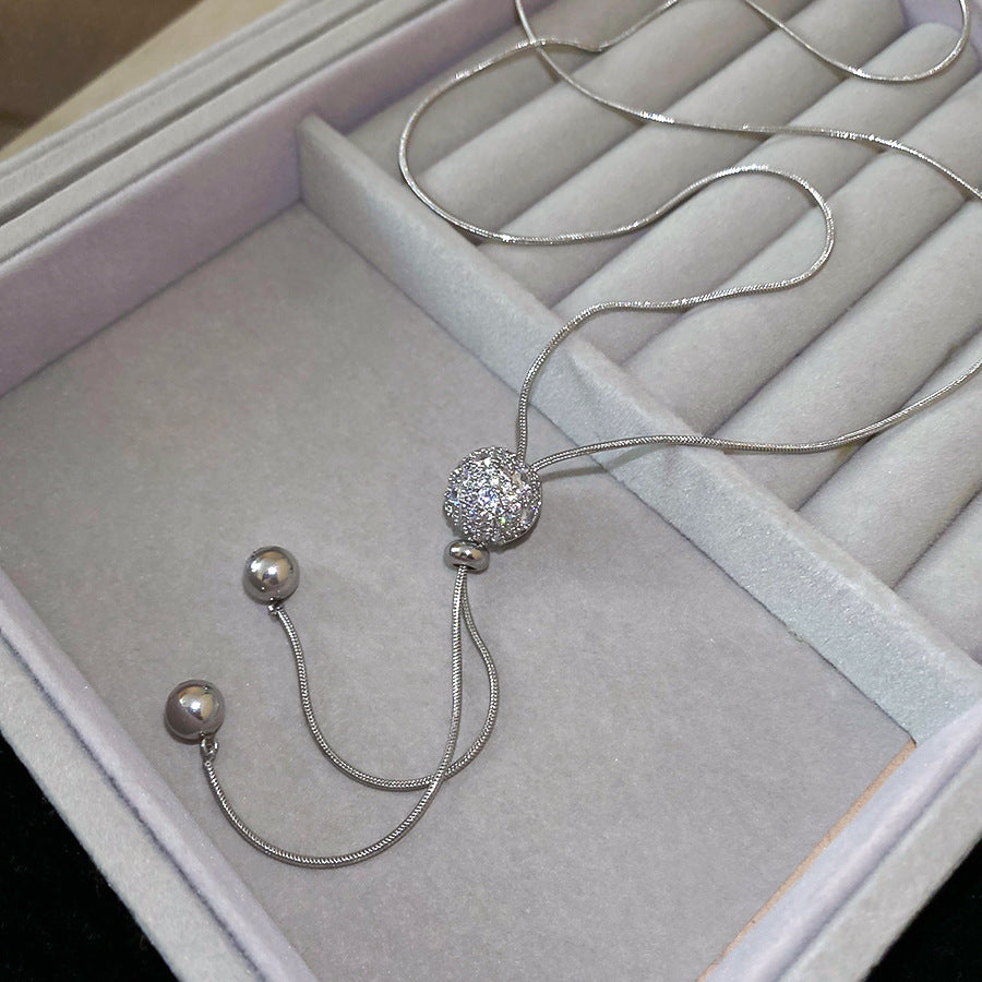 Women’s Gold or Silver Tone Elegant Box Chain Long Necklace with Ball Pendant and Tassel Detail