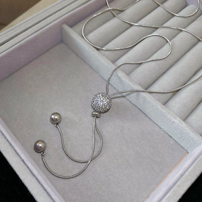 Women’s Gold or Silver Tone Elegant Box Chain Long Necklace with Ball Pendant and Tassel Detail