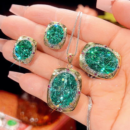 Women’s Luxury Paraiba Green Oval-Cut Cubic Zirconia Jewelry Collection with Bird’s Nest Halo Detail