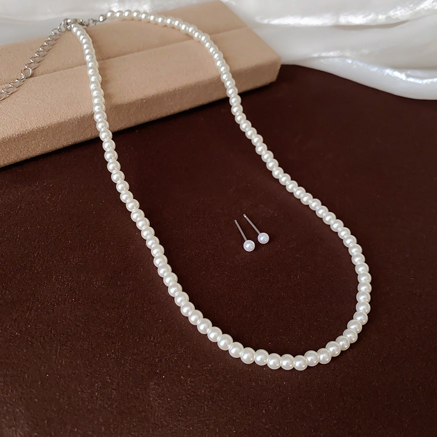 Women’s Crystal and Pearl Necklace and Stud Earrings Set