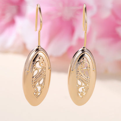 Women’s Champagne Gold Oval Drop Earrings with Openwork Scroll Detail